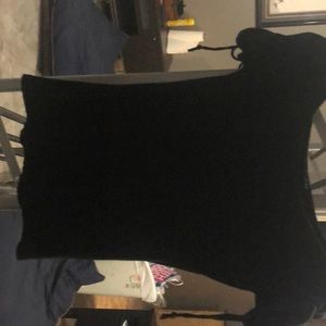 Black blouse. Ties on sleeves. Form fitting